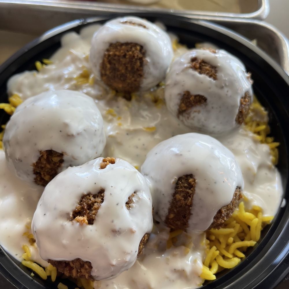 Board Bites - Falafel over rice - Lebanese Near Me - Plano, Texas Board Bites - Falafel over rice - Lebanese Near Me - Plano, Texas