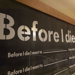 Village Gate Square - Near Polizzis there's a chalkboard for ppl to leave things they want to do before they die. Always interesting stuff