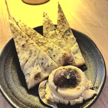 Petros82 Restaurant Don Mills - Pita points and hummus, complement of the chef - Greek Near Me - Toronto, Ontario Petros82 Restaurant Don Mills - Pita points and hummus, complement of the chef - Greek Near Me - Toronto, Ontario