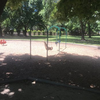 Belle Cooledge Park - Swings for infants and toddlers (and the accessible swing) on one side of the park, and swings for bigger kids on the other side. - Parks Near Me - Sacramento, California