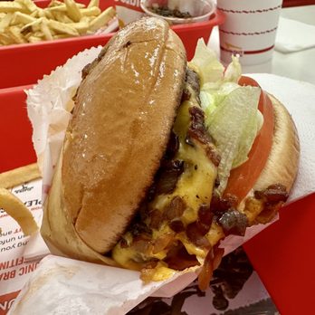 In-N-Out Burger - My sandwich...loads of lettuce, a big slice of tomato, a generous amount of grilled onions, delicious roll, But where is the beef? : 0 - Burgers Near Me - Frisco, Texas