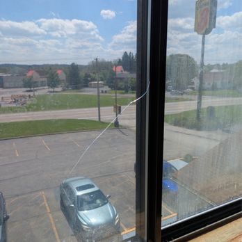 Super 8 by Wyndham New Castle - Cracked glass window - Hotels Near Me - New Castle, Pennsylvania