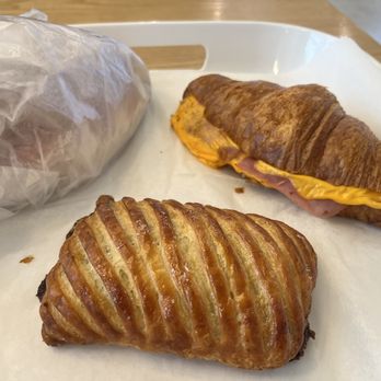 Tous Les Jours - Chocolate avalanche and ham & cheese croissant (strawberry croissant wrapped to go) - Bakeries Near Me - Columbus, Ohio Tous Les Jours - Chocolate avalanche and ham & cheese croissant (strawberry croissant wrapped to go) - Bakeries Near Me - Columbus, Ohio