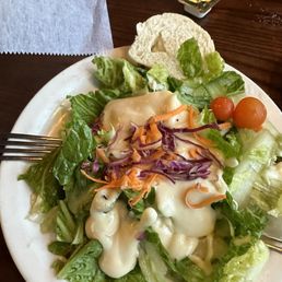 Garlic dressing on the side salad Garlic dressing on the side salad