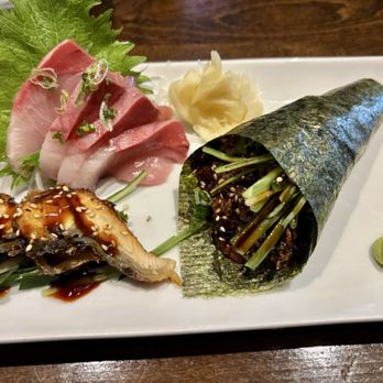 Sushi Tao Japanese Restaurant - Yellowtail sashimi on top ; unagi sashimi bottom left and salmon skin hand roll - Sushi Bars Near Me - Fort Worth, Texas