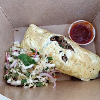 Tito Adobo - Pork adobo fried rice omelet w/ slaw and spicy banana ketchup on the side! The A. F. R. O. (Adobo Fried Rice Omelet) - Filipino Near Me