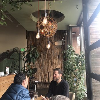 Leaf Vegetarian Restaurant - Sorry to the gentleman whomever he is. That is the top of my sister's head though. - Vegetarian Near Me - Boulder, Colorado