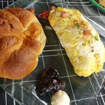La Maison Cafe - Provence omelette with a croissant and marionberry Jam. - Breakfast & Brunch Near Me - Newport, Oregon La Maison Cafe - Provence omelette with a croissant and marionberry Jam. - Breakfast & Brunch Near Me - Newport, Oregon