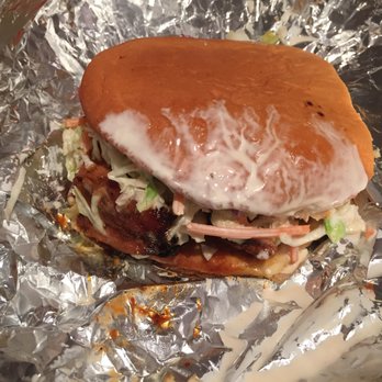 Roywoods - A conflicting sight - stale bun and hastily assembled sandwich, but such good BBQ chicken. - Caribbean Near Me - Toronto, Ontario