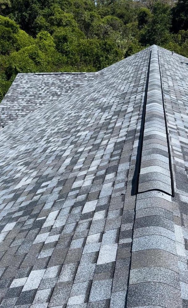 Slide of Charles Conry Roofing