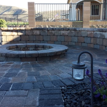 Musser Landscaping - a brick patio with a fire pit - Landscaping Near Me - Richland, Washington Musser Landscaping - a brick patio with a fire pit - Landscaping Near Me - Richland, Washington