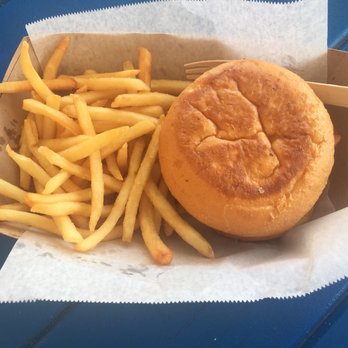 What The Fish Rolls - Fish Sandwich with fries. Hubby is a picky eater so it has no slaw and no lettuce. - Seafood Near Me - Tavernier, Florida