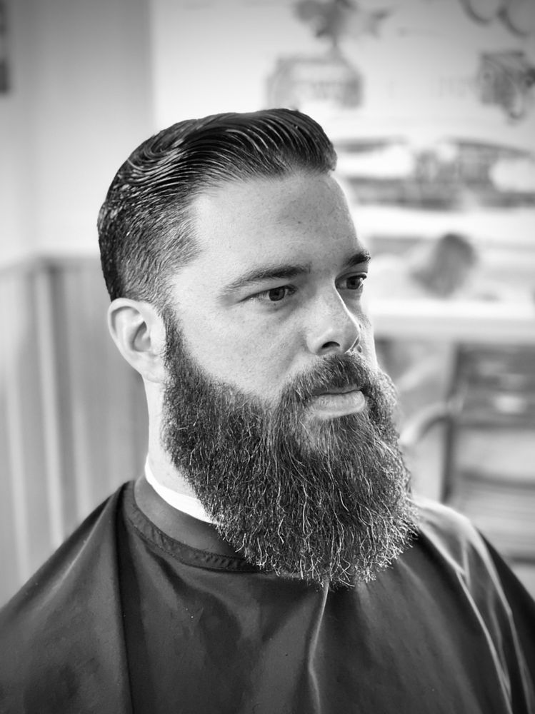 Timeless Cuts Barber Co. & Provisions  Logo