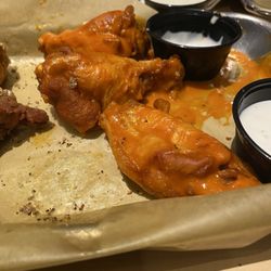 What's left of my spicy garlic wings. These are good, just need a little bit more garlic flavor.