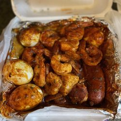 Krab Kingz Seafood Little Elm - Boiled eggs, Potatoes, Sausage, #4 Large Boiled Shrimp Platter (I think) Spicy
