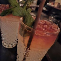 Green Swizzle. It's not as sweet as it looks and more delicious than it sounds. Green Swizzle. It's not as sweet as it looks and more delicious than it sounds.
