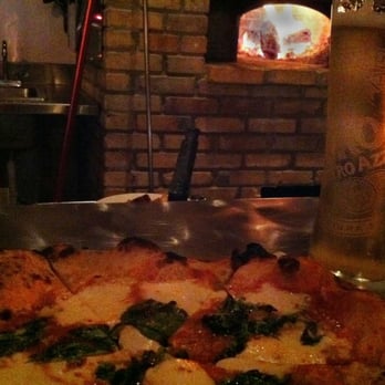 The Backspace - Piping hot Margherita Pizza, 850 degree wood-fired oven, 39 degree draught Peroni (left to Right) - Italian Near Me - Austin, Texas