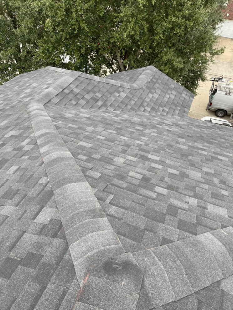 Slide of Reality Roofing