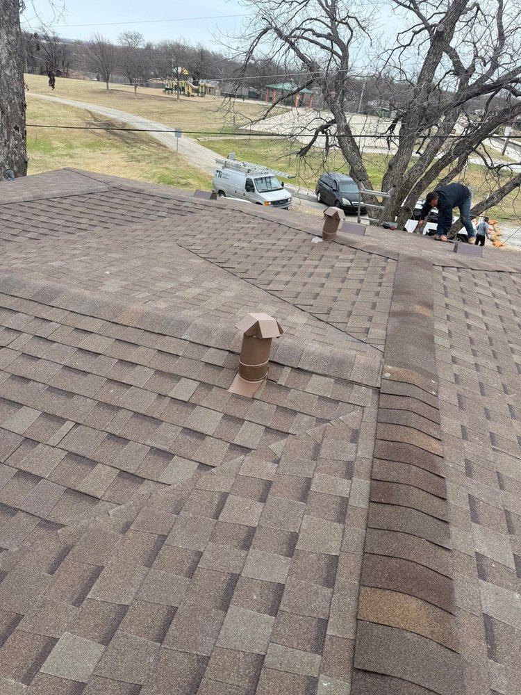 Slide of Apogee Roofing