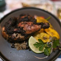 The Painted Olive - Jerk cornish hen with rice and peas, crispy plantains and veggies