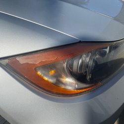 Prestige Collision Center - Front headlight clear pealing