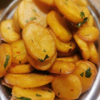 Mosaic Resto Lounge - a bowl of sliced potatoes - Lounges Near Me - Saint-Laurent, Quebec Mosaic Resto Lounge - a bowl of sliced potatoes - Lounges Near Me - Saint-Laurent, Quebec