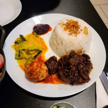 Tasya’s Kitchen - Rendang Daging, a thick and slow-cooked coconut milk based spicy stew of beef. - Indonesian Near Me - Somersworth, New Hampshire Tasya’s Kitchen - Rendang Daging, a thick and slow-cooked coconut milk based spicy stew of beef. - Indonesian Near Me - Somersworth, New Hampshire