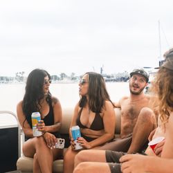 OverWater Mission Bay - Enjoying friends and our favorite drinks on the SunTracker pontoon boat rental