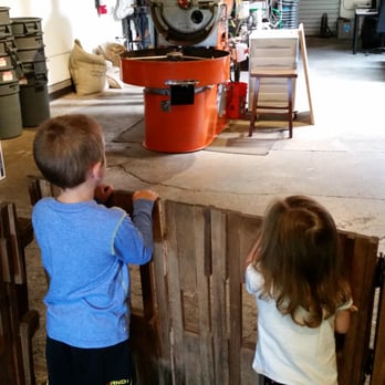 Temple Coffee - Both kids are intrigued by the coffee bean machine. - Coffee & Tea Near Me - Sacramento, California