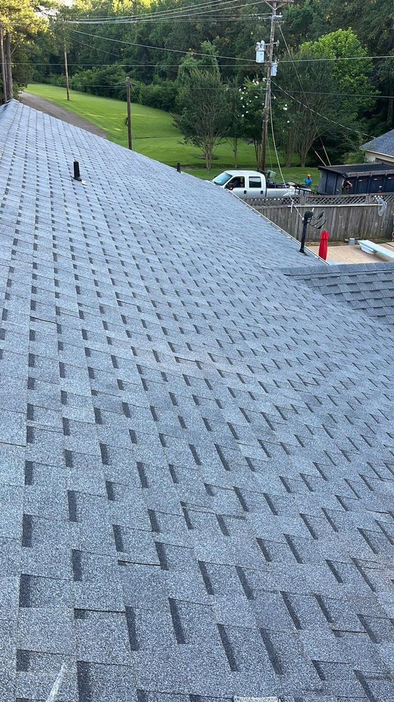 Slide of Cox Roofing