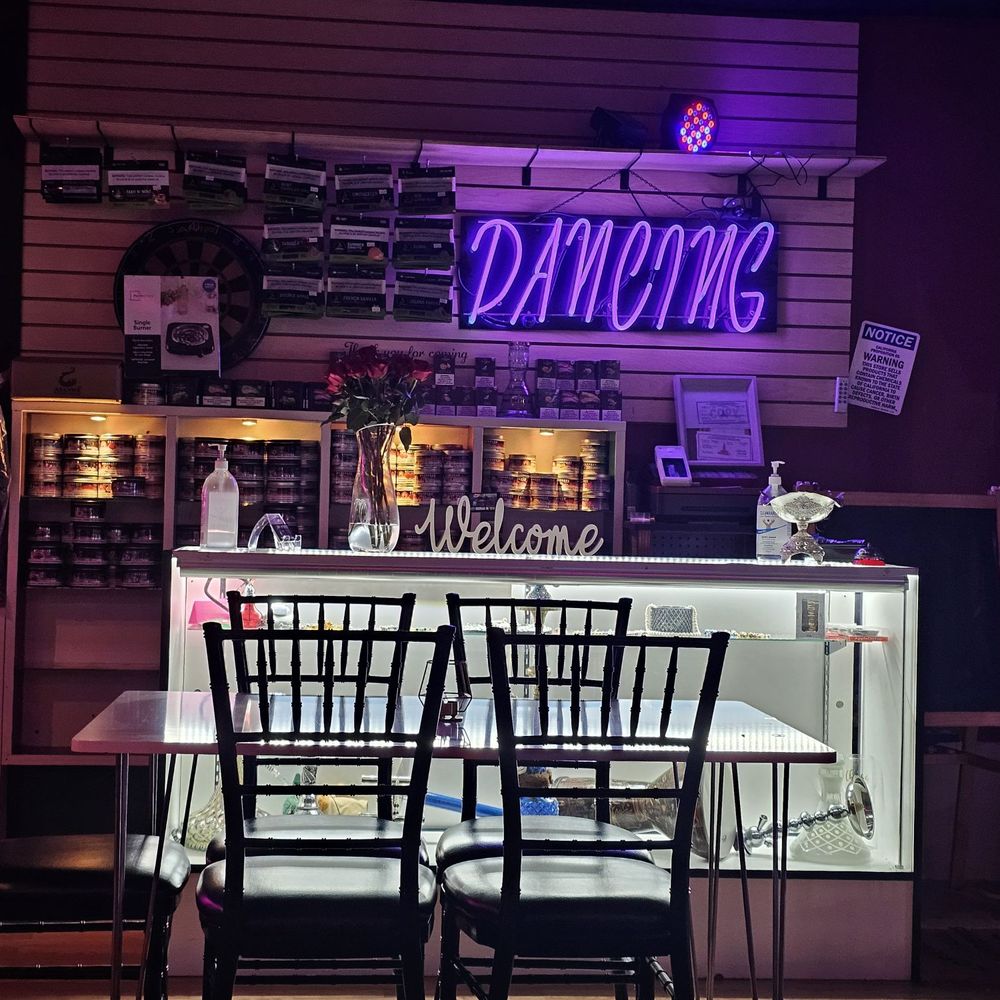 Halo Zone Hookah Lounge - a neon sign above the bar - Hookah Bars Near Me - Los Angeles, California Halo Zone Hookah Lounge - a neon sign above the bar - Hookah Bars Near Me - Los Angeles, California