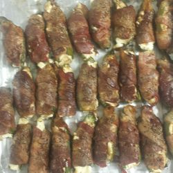 B & L Smoked Meats - Bacon wrapped Jalapeño pepper poppers stuffed with special cream cheese mixture and smoked to perfection.  Great appetizer for any party.