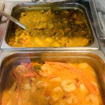 Jerk Center Bakery - Top: Curry Lobster, Shrimp & Conch - Caribbean Near Me - Margate, Florida Jerk Center Bakery - Top: Curry Lobster, Shrimp & Conch - Caribbean Near Me - Margate, Florida