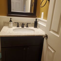 Simply Cabinetry - Powder room cabinet with matching mirror