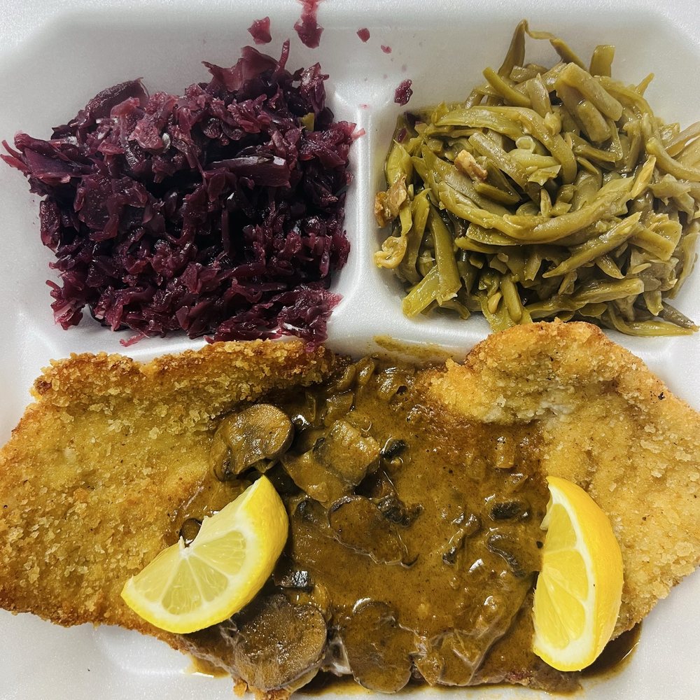 Jaeger schnitzel, red, cabbage, and green beans. Not pictured: variety of delicious homemade rolls with butter.DELICIOUS!!! Jaeger schnitzel, red, cabbage, and green beans. Not pictured: variety of delicious homemade rolls with butter.DELICIOUS!!!