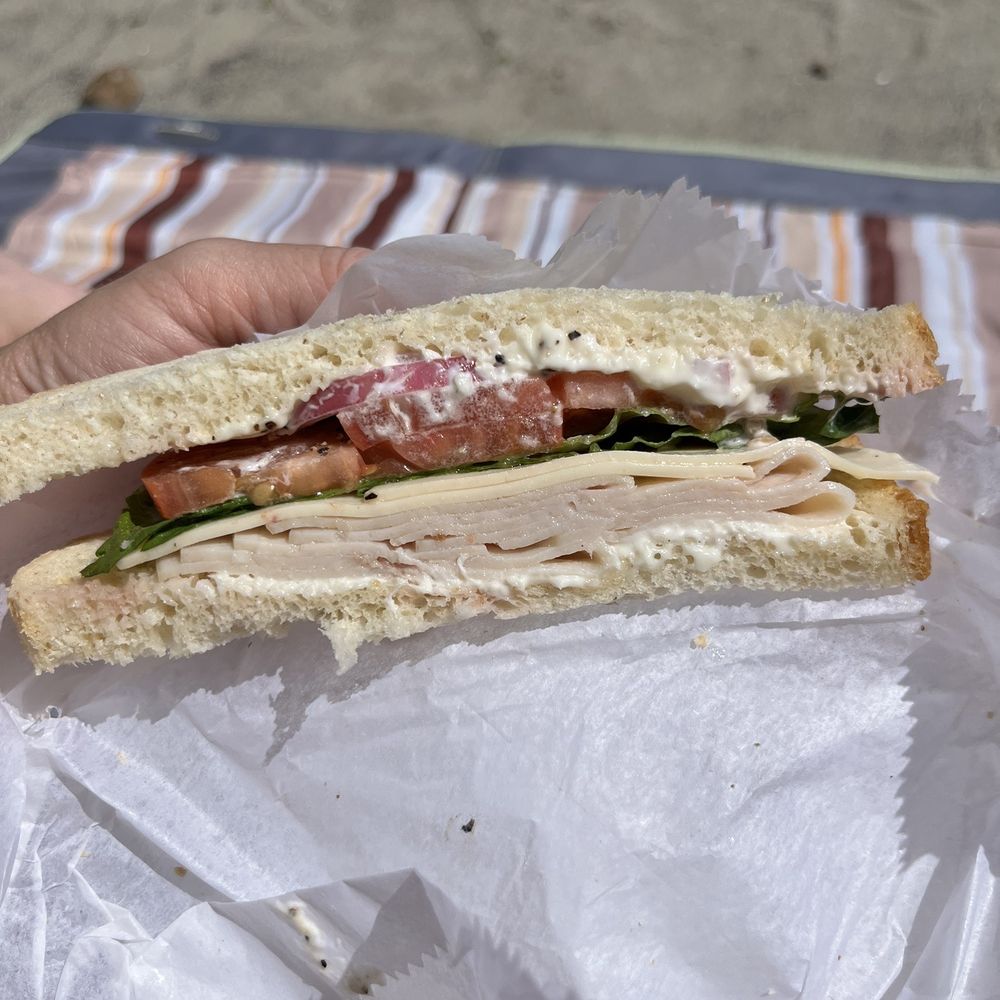 Turkey and provolone sandwich on sliced sourdough. Literally almost nothing to it. Turkey and provolone sandwich on sliced sourdough. Literally almost nothing to it.