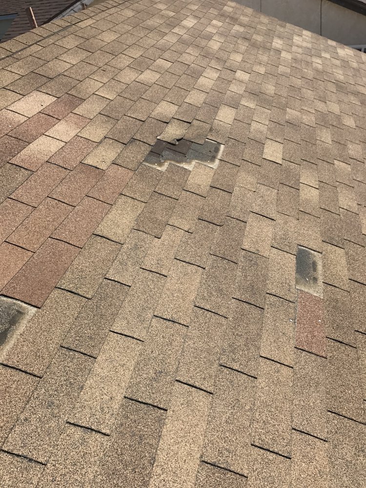 Slide of The Roof Repair Guy