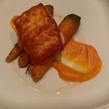 Bacchus - A Bartolotta Restaurant - Salmon and roasted carrots with carrot purée - New American Near Me - Milwaukee, Wisconsin Bacchus - A Bartolotta Restaurant - Salmon and roasted carrots with carrot purée - New American Near Me - Milwaukee, Wisconsin