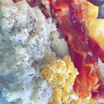 Frequency Restaurant & Lounge - Breakfast Bar: Eggs Grits Bacon Hasbrowns Pineapples - American Near Me - Jacksonville, Florida Frequency Restaurant & Lounge - Breakfast Bar: Eggs Grits Bacon Hasbrowns Pineapples - American Near Me - Jacksonville, Florida