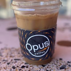 Opus Coffee Airstream - 16 oz Iced coffee with salted caramel syrup, caramel sauce, and oat milk. Cost $4.44
