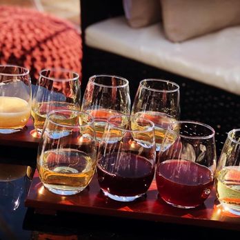 Red Heifer Winery - a tray of wine glasses - Wineries Near Me - Smithsburg, Maryland Red Heifer Winery - a tray of wine glasses - Wineries Near Me - Smithsburg, Maryland