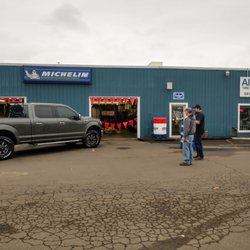 Albany Tire & Wheel - Customer checking out his new Moto Metal wheels wrapped with Cooper AT3 XLT tires.
