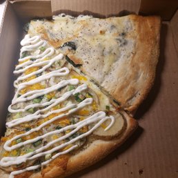 potato pizza on botton left and stuffed spinach on the right potato pizza on botton left and stuffed spinach on the right