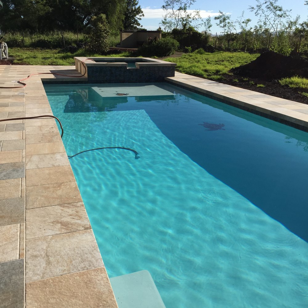 SCV Pools - Another angle of the Kona pool. You can see the hot tub and the California ledge we added to our pool plans. Again, SCV pools. - Pool & Hot Tub Service Near Me - Kailua-kona, Hawaii SCV Pools - Another angle of the Kona pool. You can see the hot tub and the California ledge we added to our pool plans. Again, SCV pools. - Pool & Hot Tub Service Near Me - Kailua-kona, Hawaii