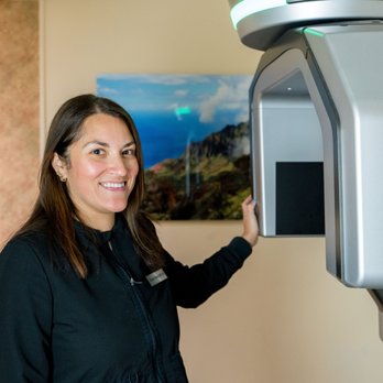 Bell Dental Studio - Hygienist Nicole with our CT 3D xray equipment - General Dentistry Near Me - Austin, Texas Bell Dental Studio - Hygienist Nicole with our CT 3D xray equipment - General Dentistry Near Me - Austin, Texas