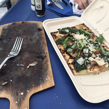 Boathouse - Goat cheese and prosciutto flatbread with fig jam. With an awesome "to go" box made for the flatbread and recyclable. Nice! - Breakfast & Brunch Near Me - Stuart, Florida