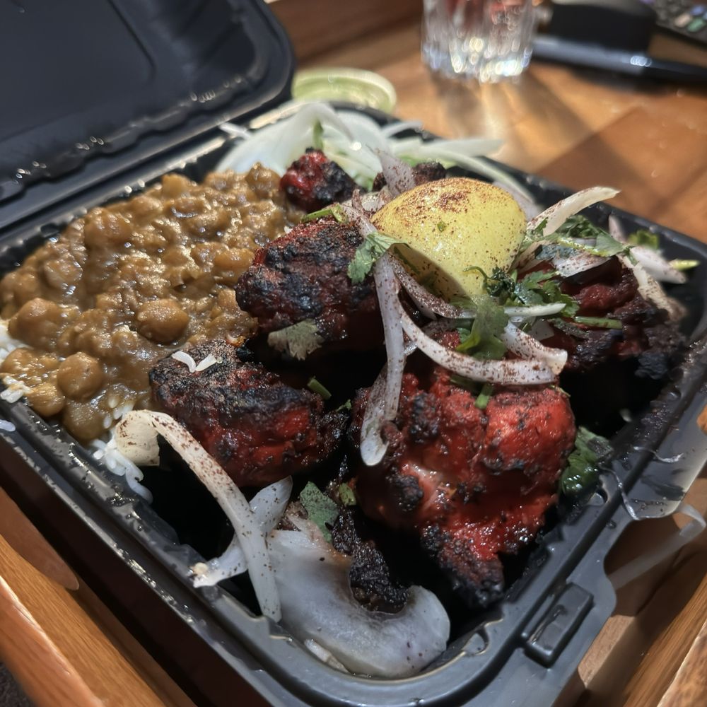 Lamb kabob and Chicken Tikka combo with rice and chickpeas. Lamb kabob and Chicken Tikka combo with rice and chickpeas.