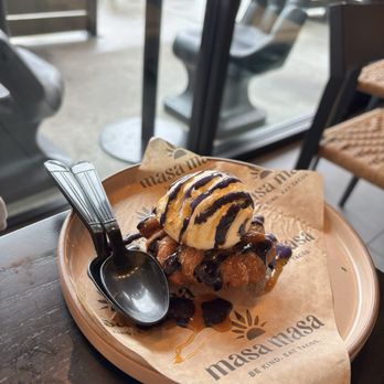 Masa Masa - Churro donut with vanilla ice cream and ube and caramel drizzle - Tacos Near Me - Roseville, California Masa Masa - Churro donut with vanilla ice cream and ube and caramel drizzle - Tacos Near Me - Roseville, California