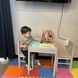 Elite Chiropractic NW - our son enjoying the play area for kids - they're super kid friendly and we very much appreciate it!