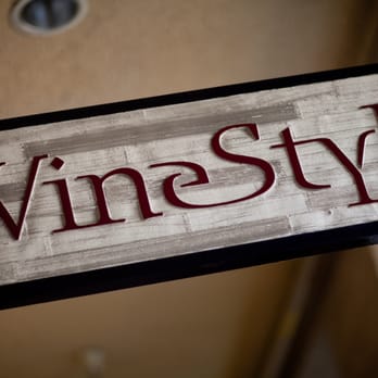 WineShoppe - a sign hanging from a chain - Beer, Wine & Spirits Near Me - Torrance, California WineShoppe - a sign hanging from a chain - Beer, Wine & Spirits Near Me - Torrance, California
